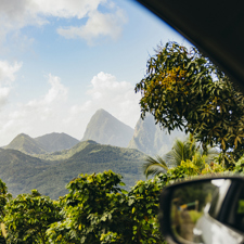 A view of St Lucia through a car window.