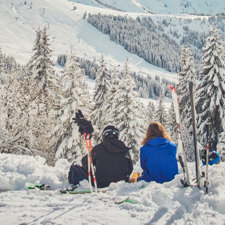 Two people about to go skiing.
