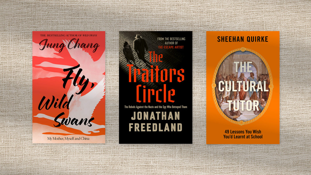 Book jackets on a linen background.