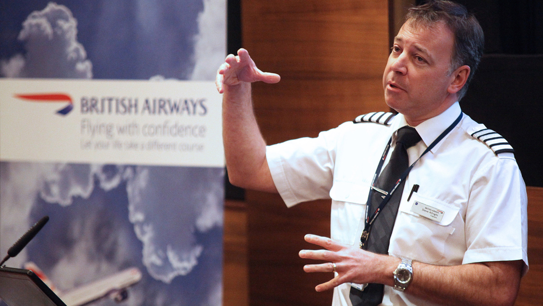 Captain Steve Allright giving a nervous flyer talk.