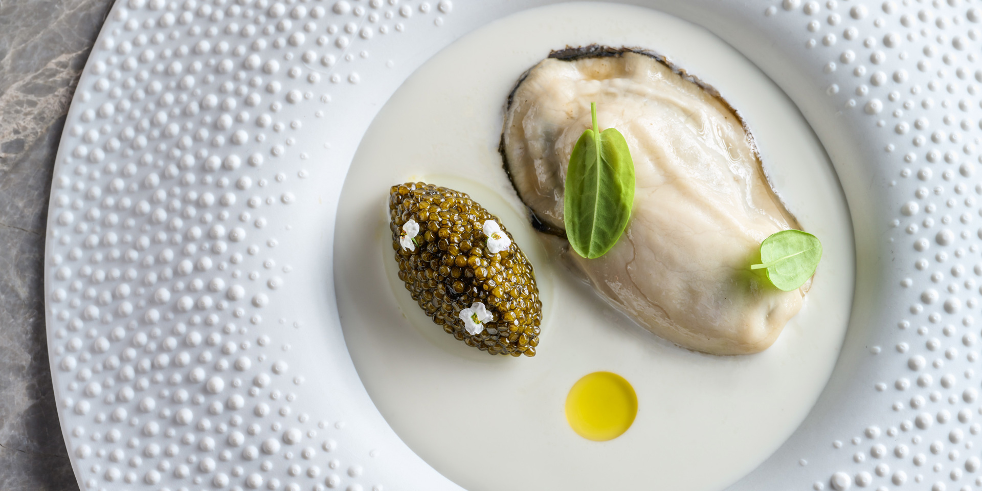 An oyster and caviar dish from VEA in Hong Kong.